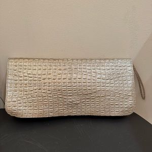 J. Birnbaum gold embossed leather clutch